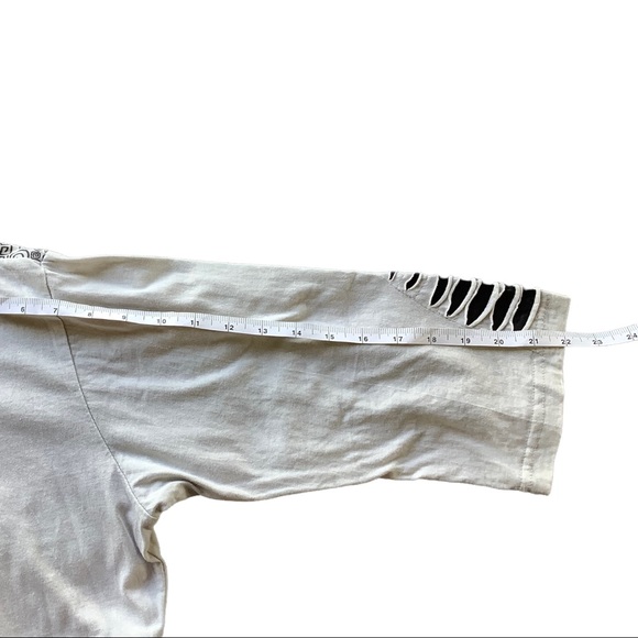 3/4 sleeve of comfy stretchy 100% cotton top in off white and black. - Picture 11 of 16